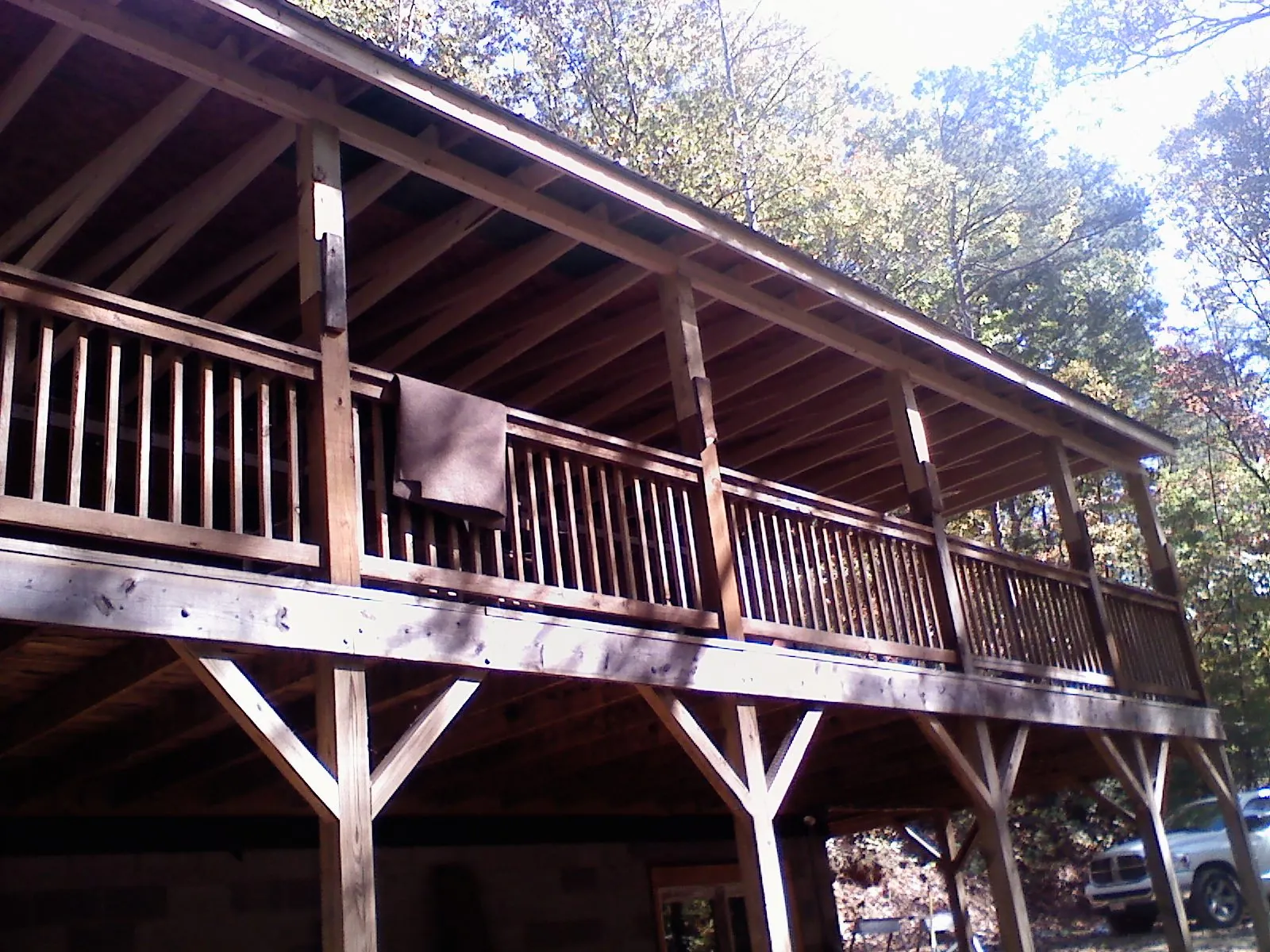 Timber framing under a new elevated porch and deck — Roof Leak Repair in Baldwin by Roofing Brothers